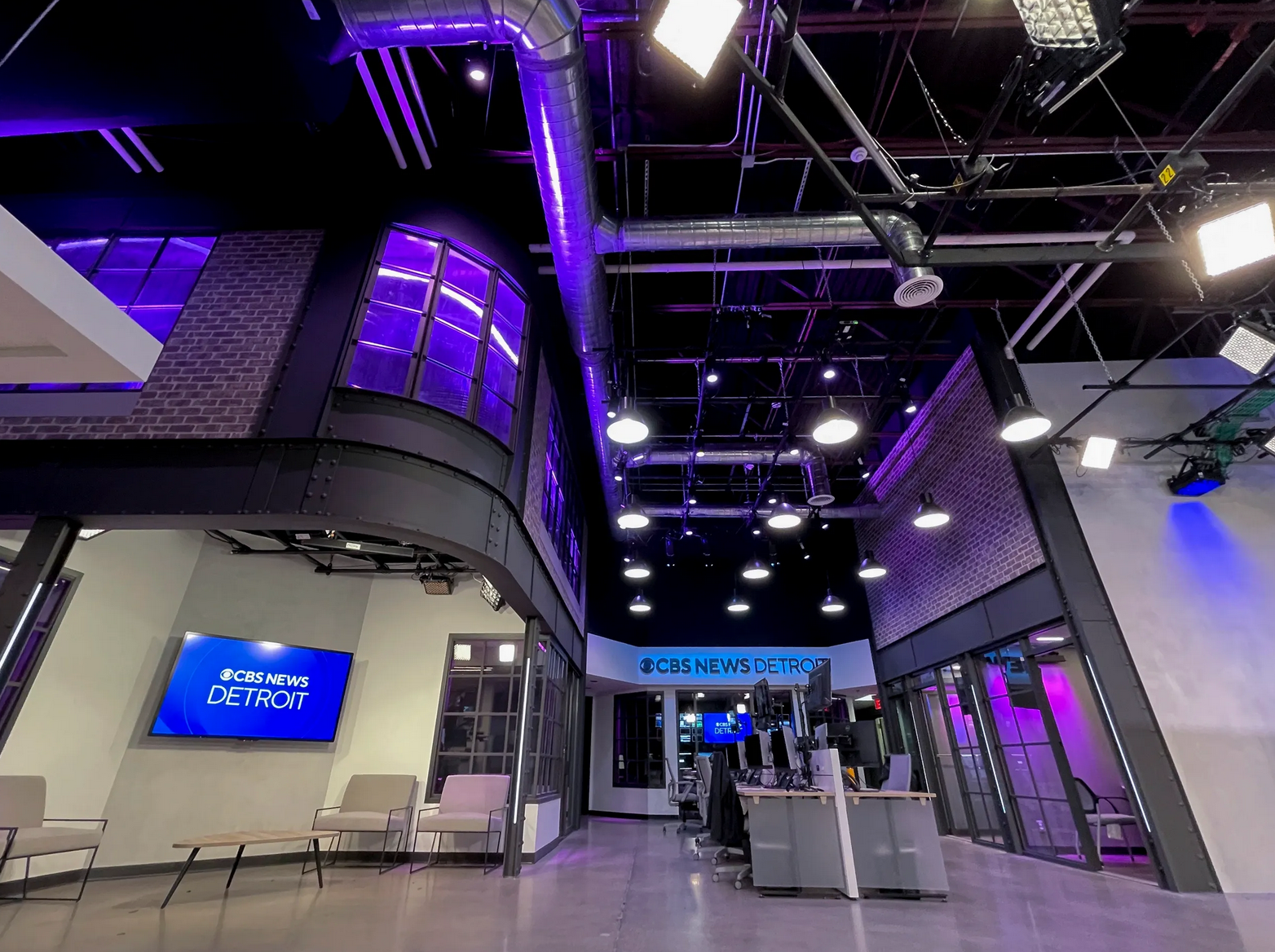 CBS News Detroit studio with curved riveted steel beams and columns with purple lighting