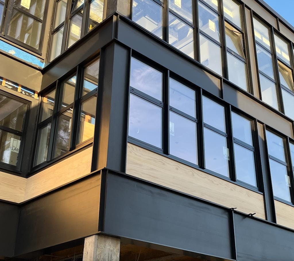 Decorative exterior channels with black steel framing