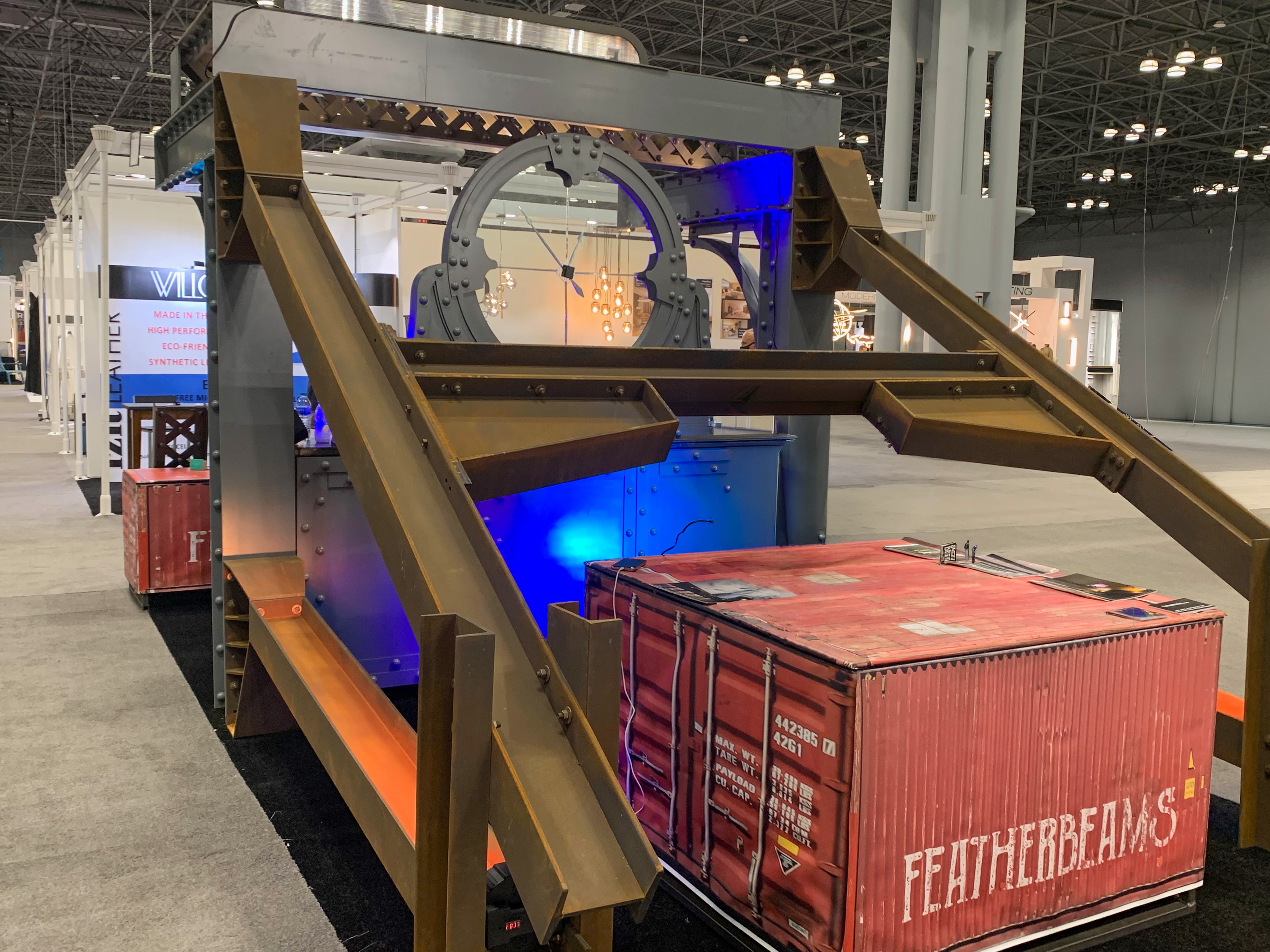 Featherbeams small expo booth with brass structural elements