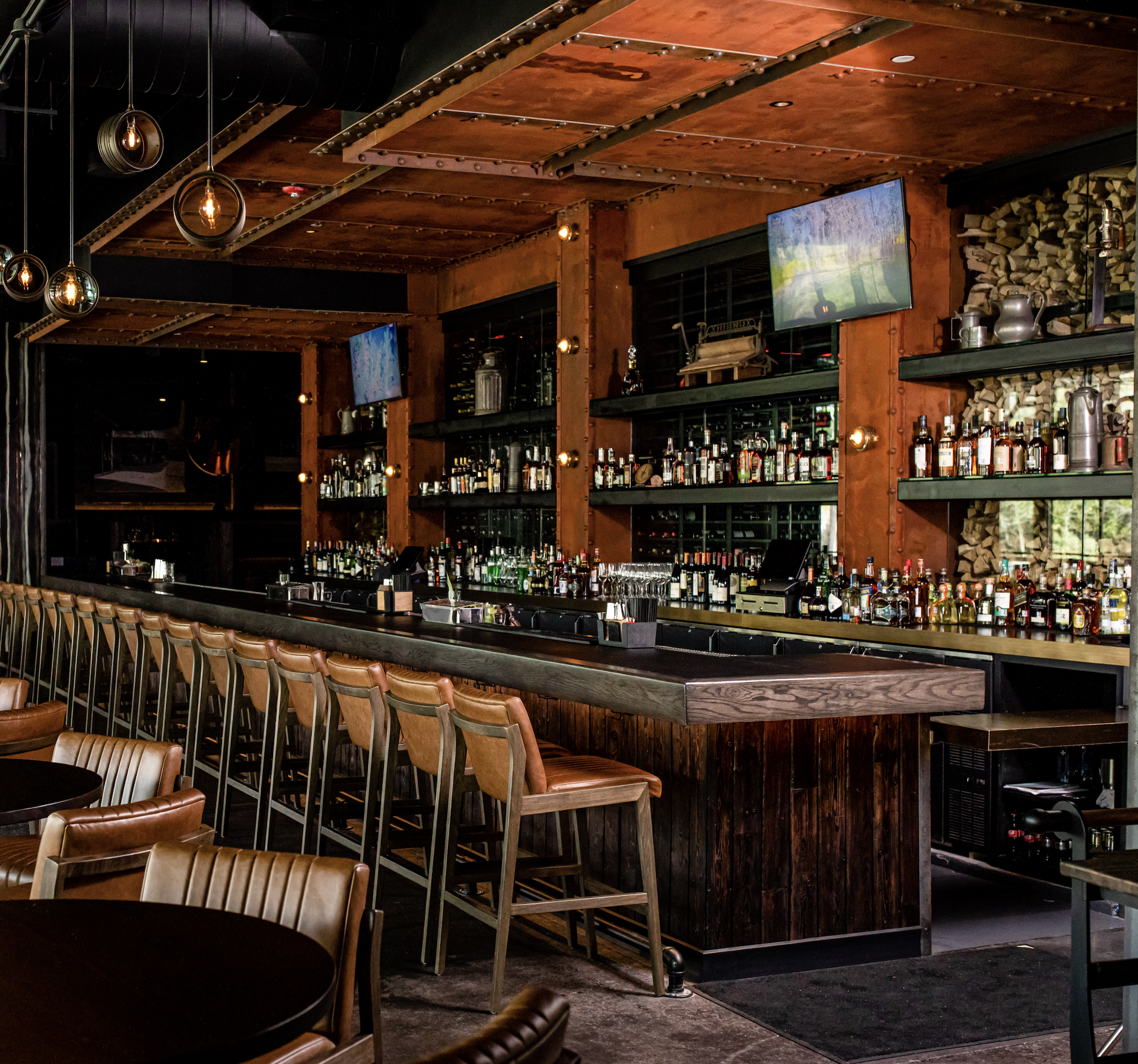 Rusted steel panels in a restaurant bar setting